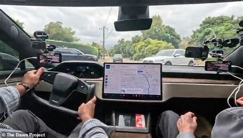 VIDEO: Self-driving Tesla nearly blows past stop sign on test drive
